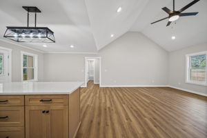 View of exceptional living room with tall vaulted ceiling