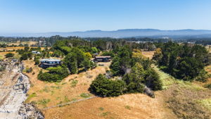 Arial view of house with blufftop