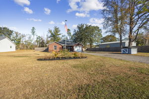 Curb Appeal with Landscaping, Fenced, Flagpole, Pump House (NO WATER BILL)