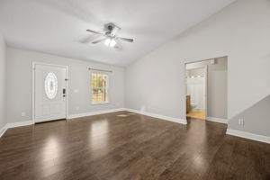 Living Room with Vaulted Ceiling and Ceiling Fan
