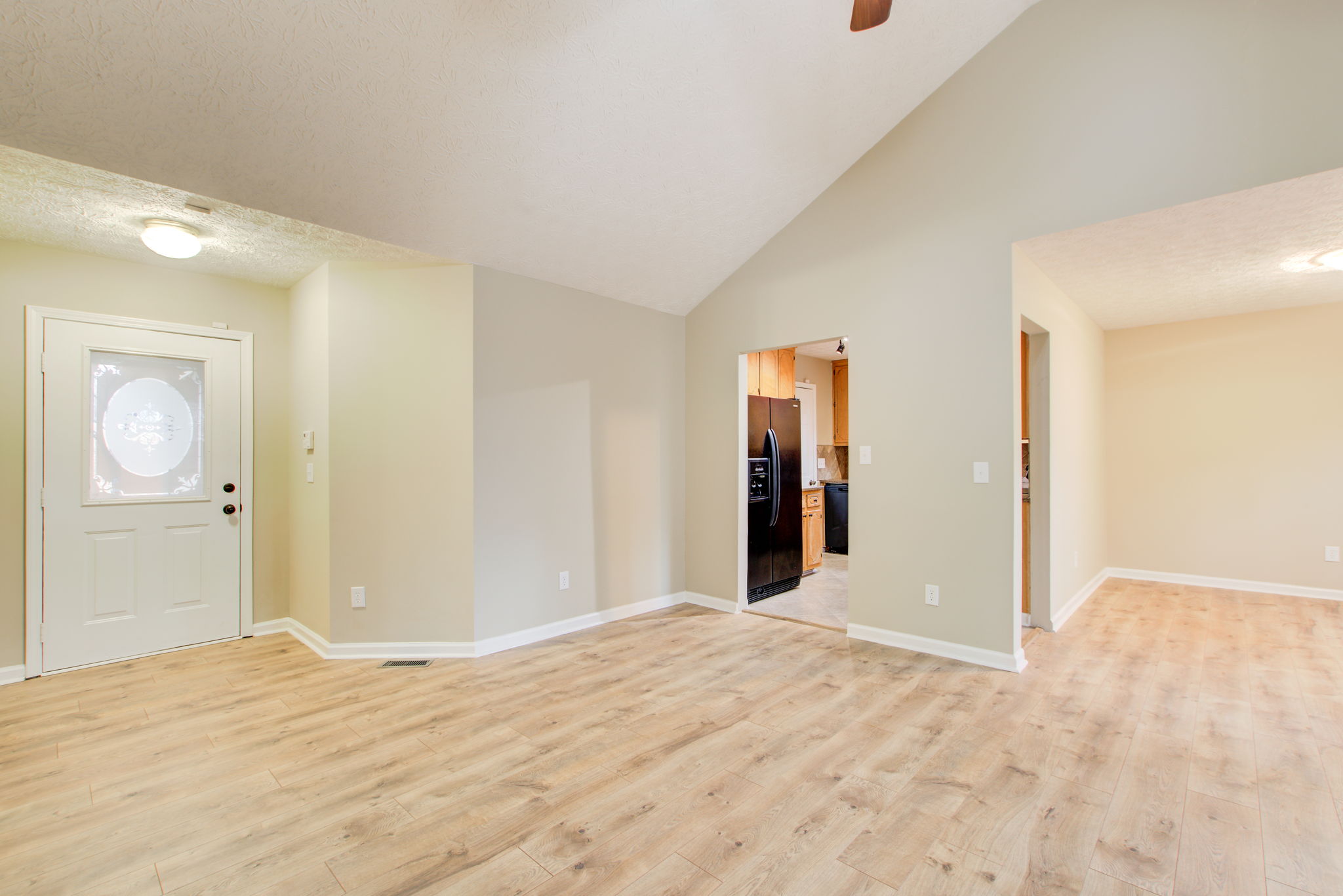 5 Living Room w Entry Kitchen + Dining
