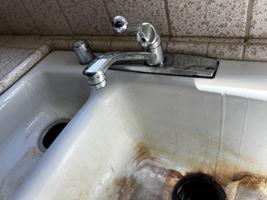 Kitchen Sink is Stained, Faucet Leaks