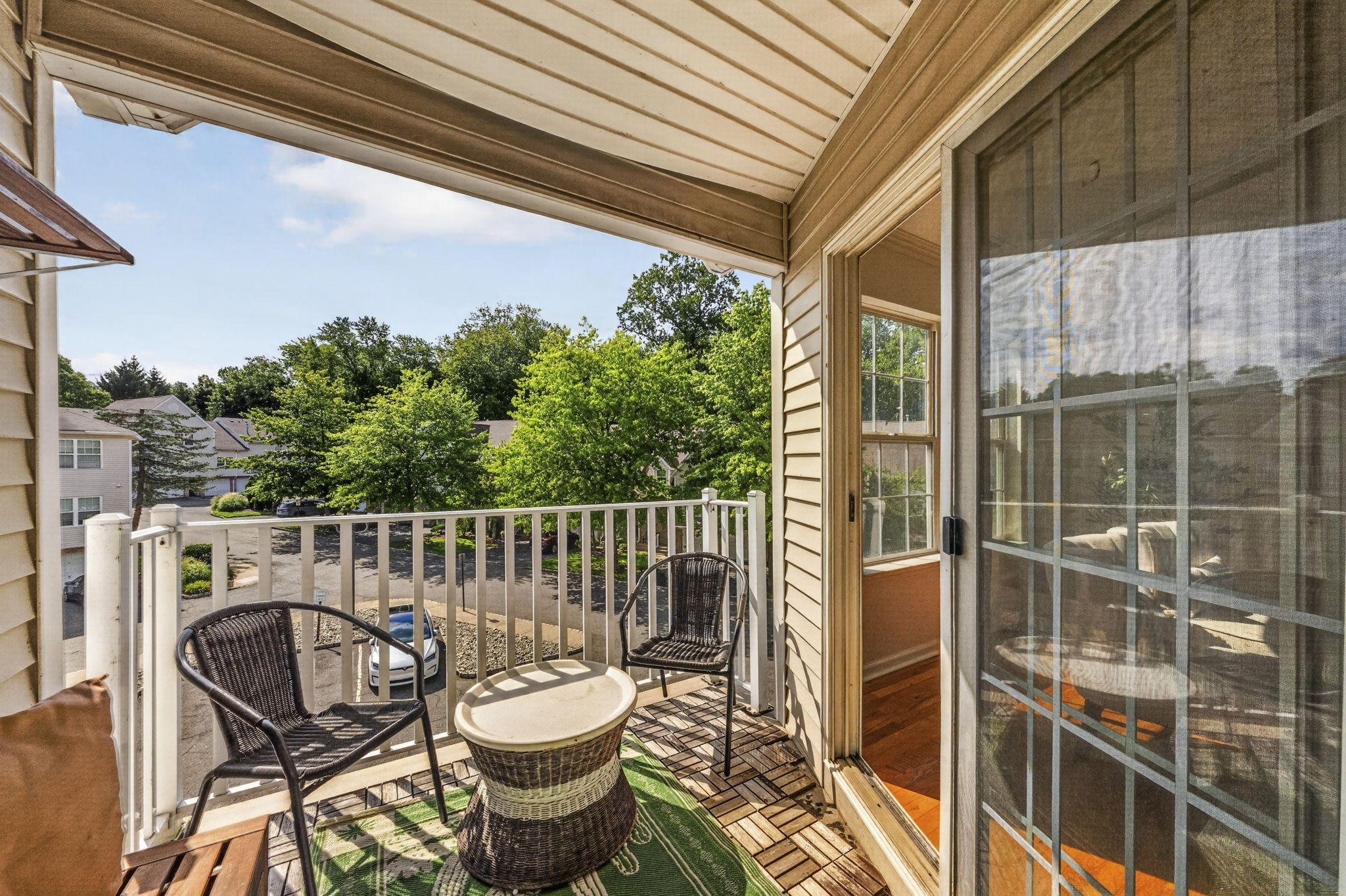 Use The living room slider to access this generous covered balcony, closet for some storage & utilities