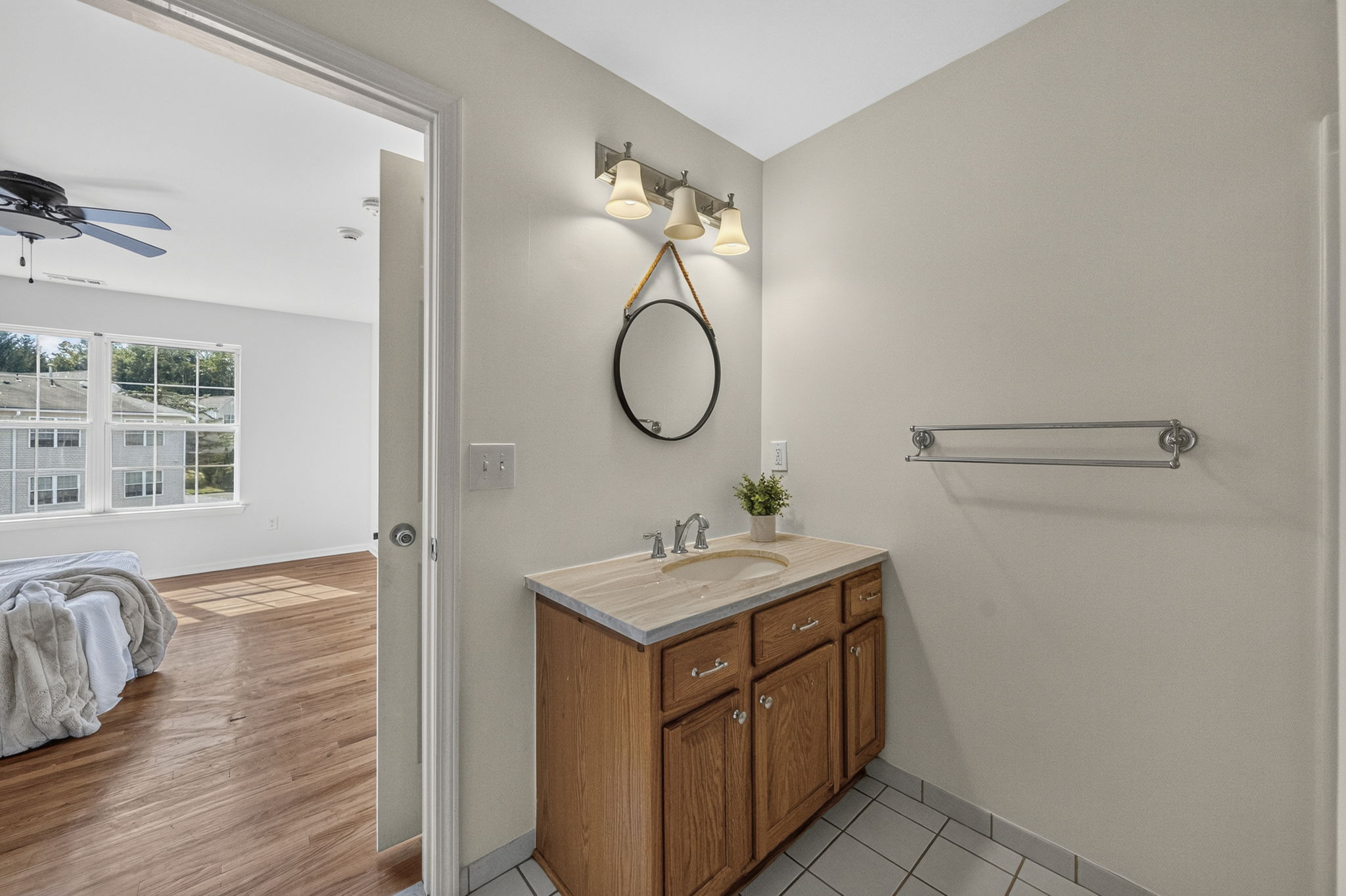 Primary Bedroom with walk in closet with built ins, valet, drawers-including a velvet two tier jewelery drawer, private bathroom with shower and attic access from WIC.