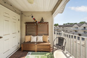Use The living room slider to access this generous covered balcony, closet for some storage & utilities
