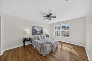 Primary Bedroom with walk in closet with built ins, valet, drawers-including a velvet two tier jewelery drawer, private bathroom with shower and attic access from WIC.