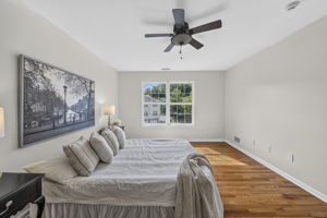Primary Bedroom with walk in closet with built ins, valet, drawers-including a velvet two tier jewelery drawer, private bathroom with shower and attic access from WIC.