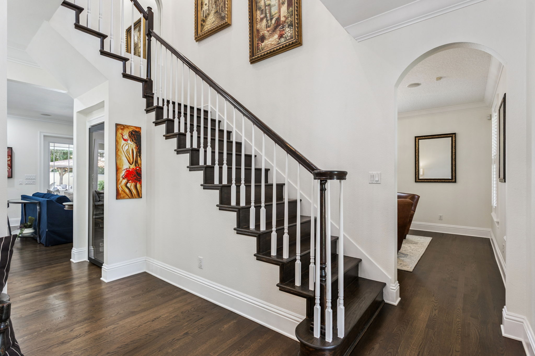 Two staircases provide convenient access throughout the home