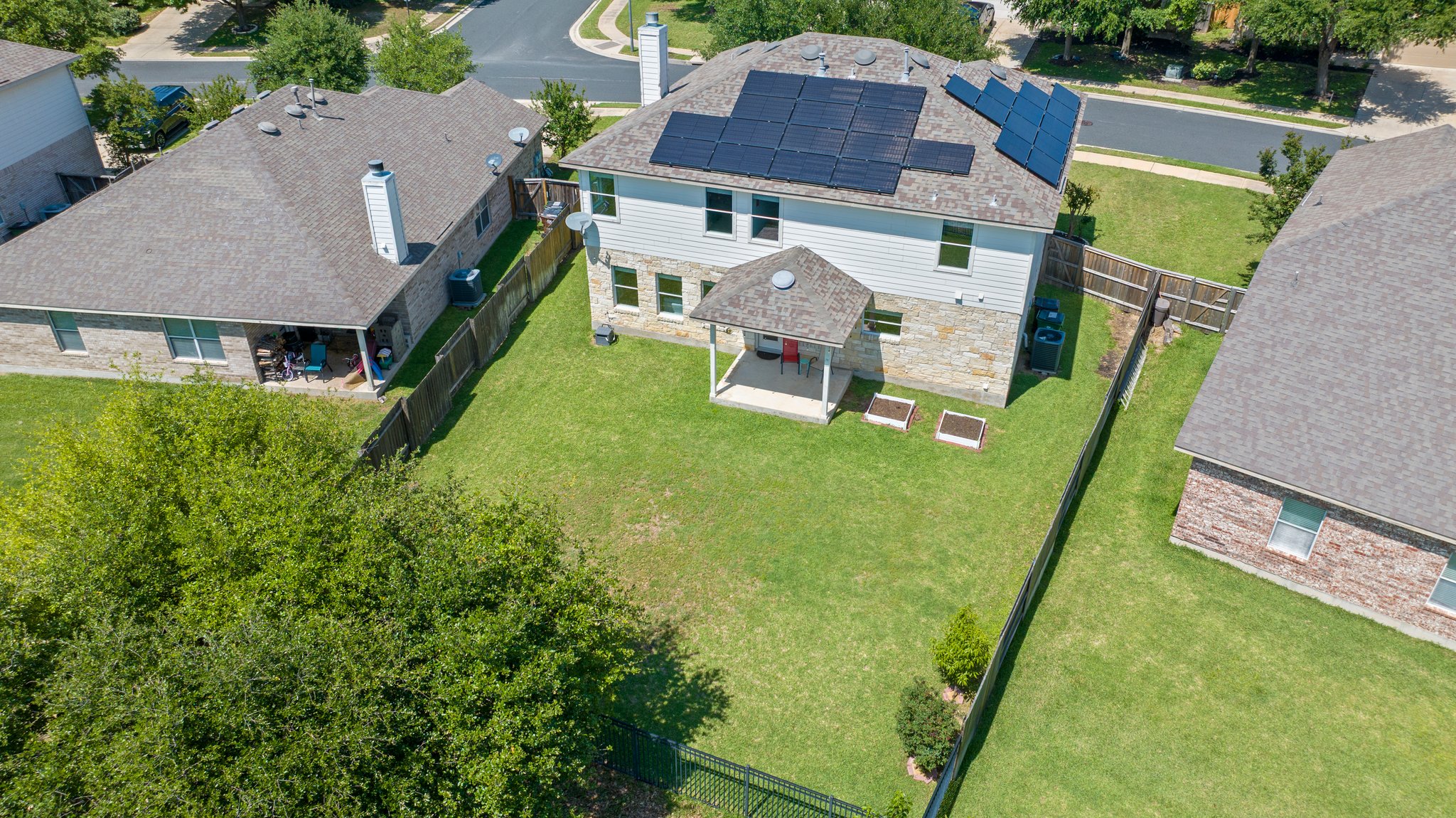 Spacious yard. House has solar panels.