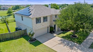 No back neighbors! 4BR/2.5BA lovely home in Teravista that backs to a neighborhood pond.