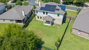 Spacious yard. House has solar panels.