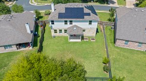 Spacious yard. House has solar panels.