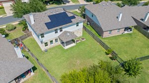 Spacious yard. House has solar panels.