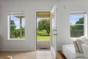 The door to the back yard has a great view of one of Teravista's community ponds.