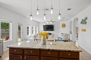 Nice and open floor plan with lots of natural light from the wall of windows.