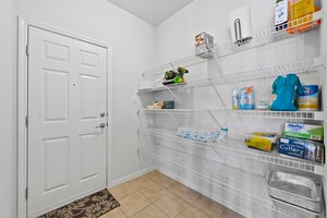 Extra storage near the garage and laundry room.
