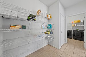 Extra storage near the garage and laundry room.