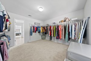 This amazing primary closet is huge!