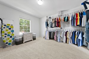 This amazing primary closet is huge!