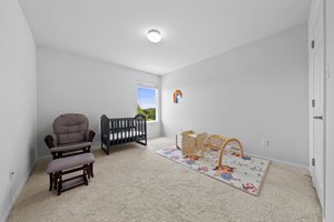 One of four upstairs bedrooms.
