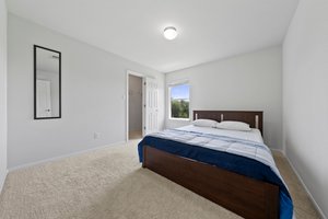 One of four upstairs bedrooms.