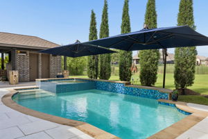 Pool with Retractable Umbrellas