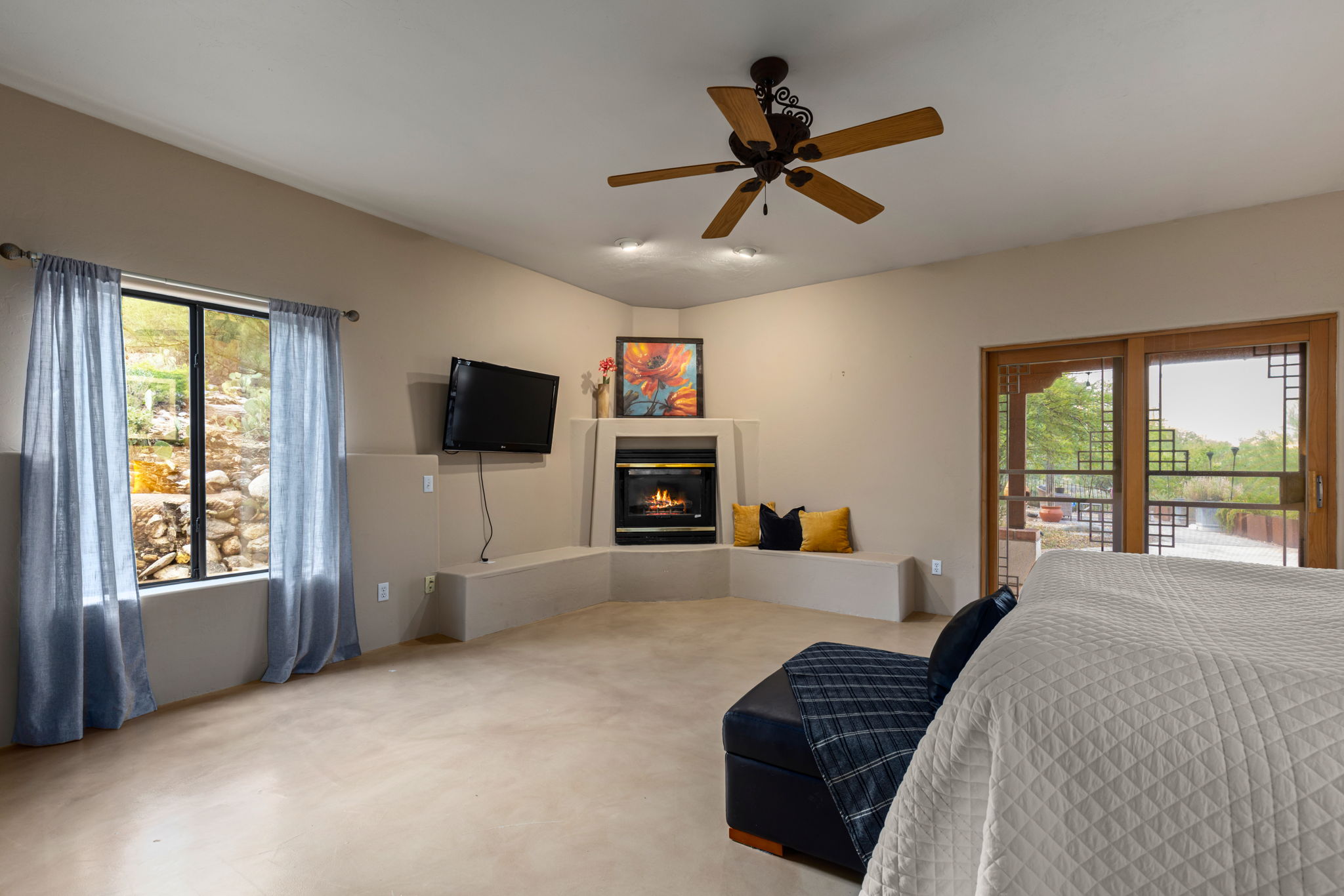 Primary Bedroom with corner fireplace