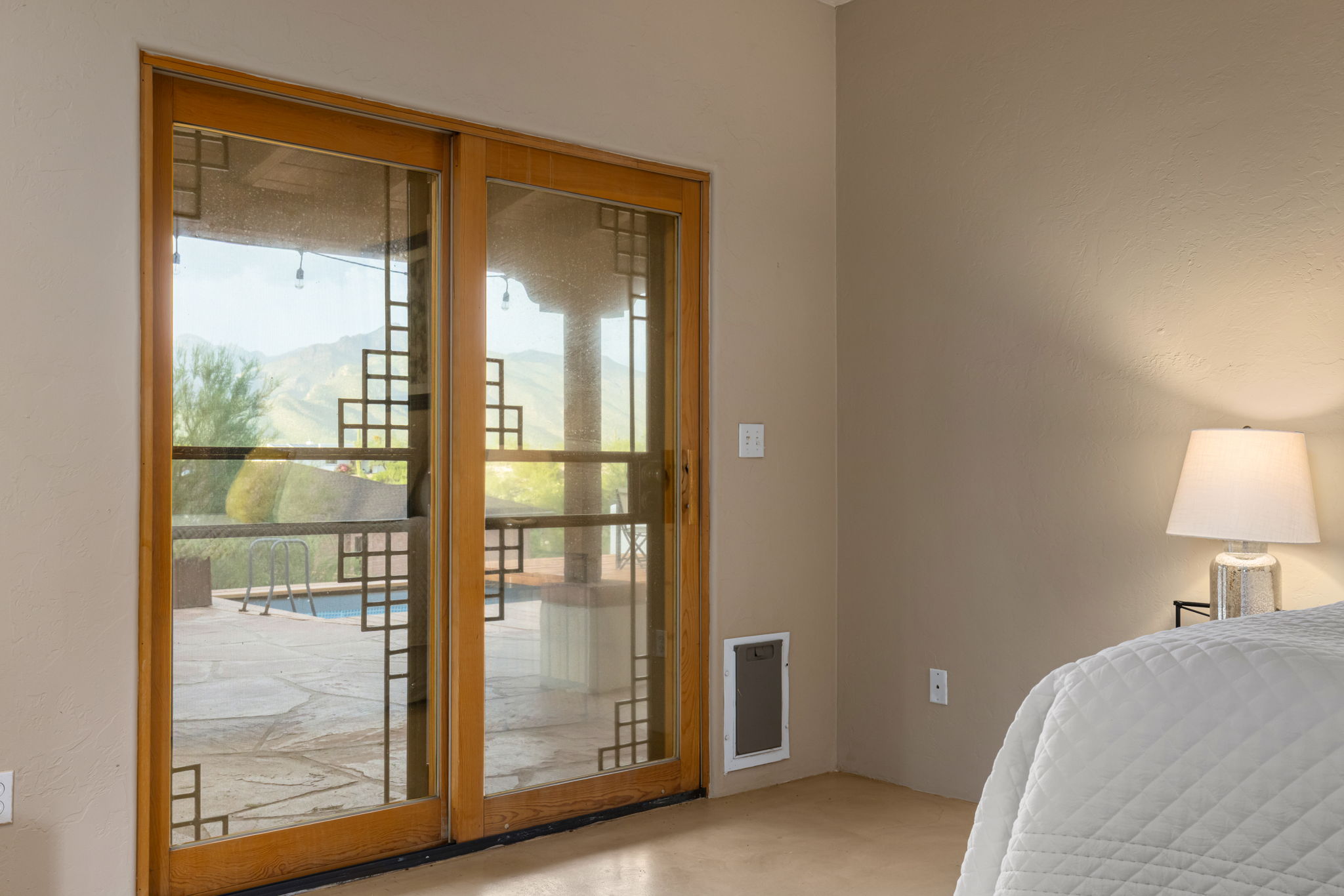 Primary Bedroom: Sliding Door to back yard