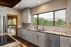 Kitchen, door to covered patio/back yard