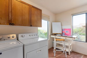 Laundry Room with bonus room