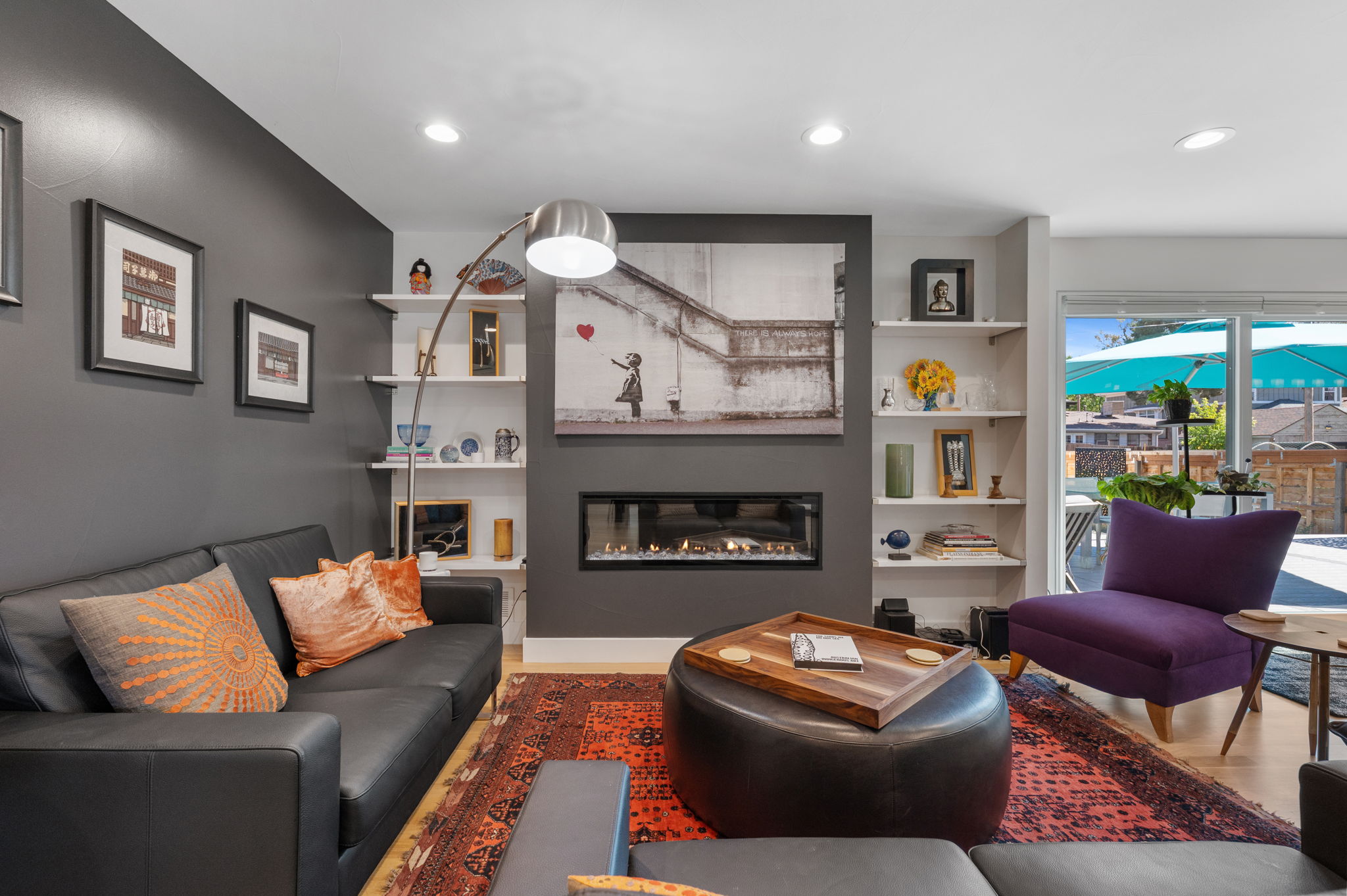 Built-in bookshelves on either side of the fireplace