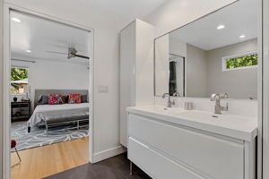 Double vanity and storage on either side