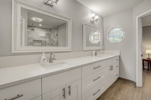 Shared Bathroom 3 / Abundant Cabinets & Counter