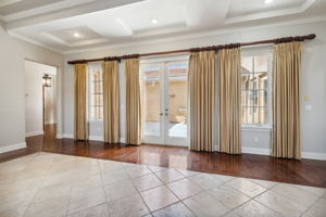 Combined Living/Dining Room Opens to  Courtyard