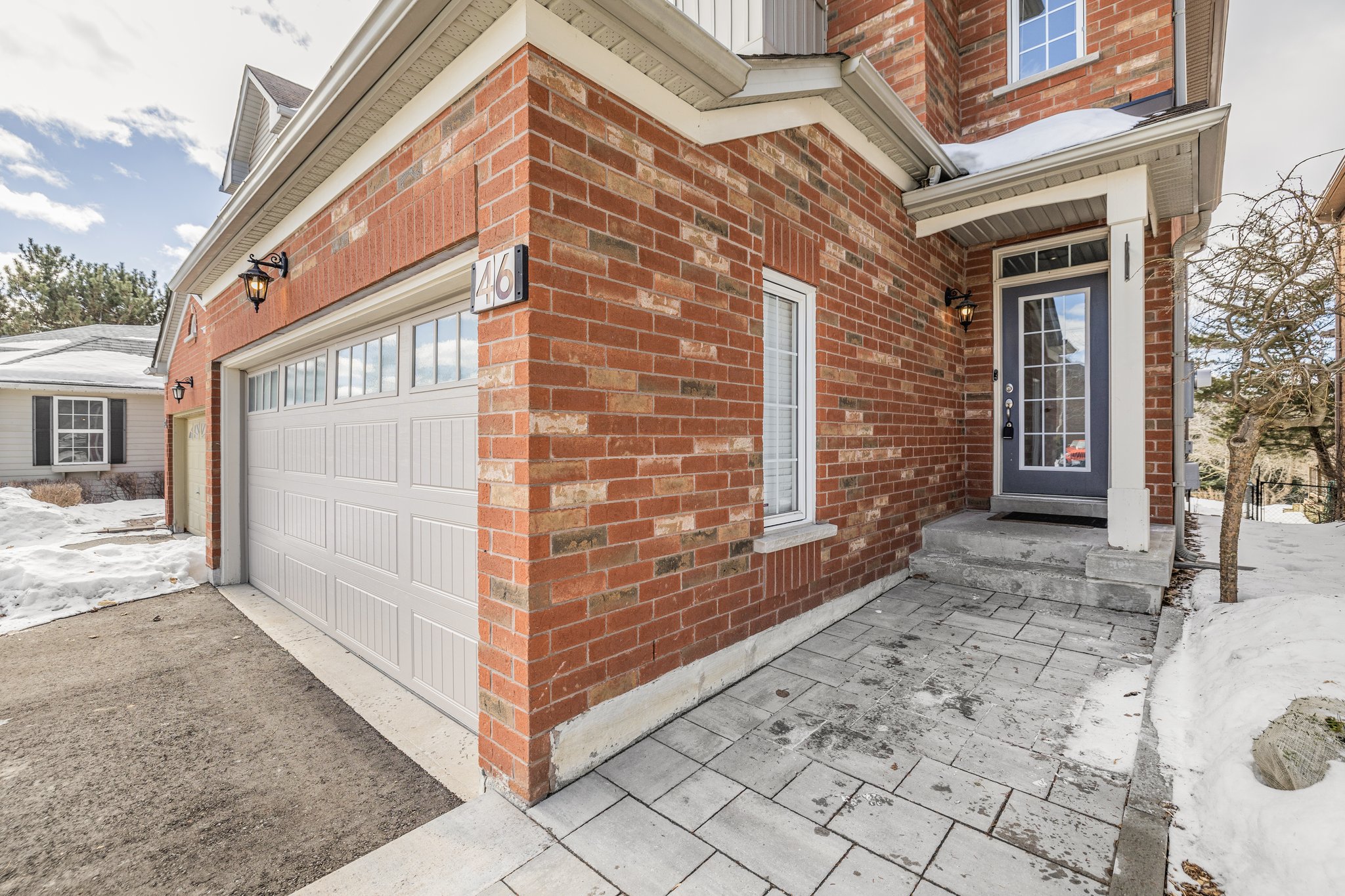 Professionally landscaped front walkway & gardens