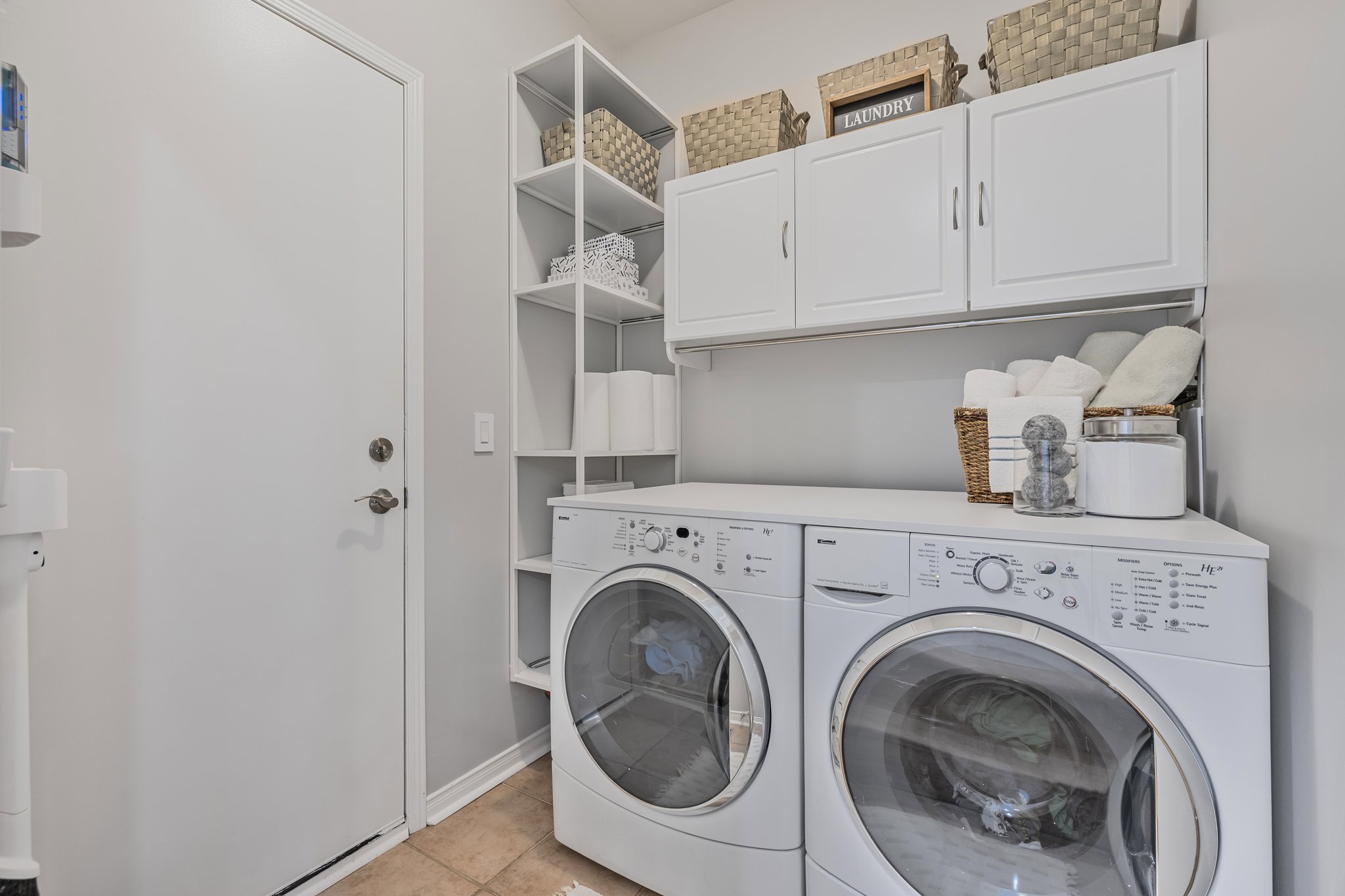 Main floor laundry/mud room with garage access