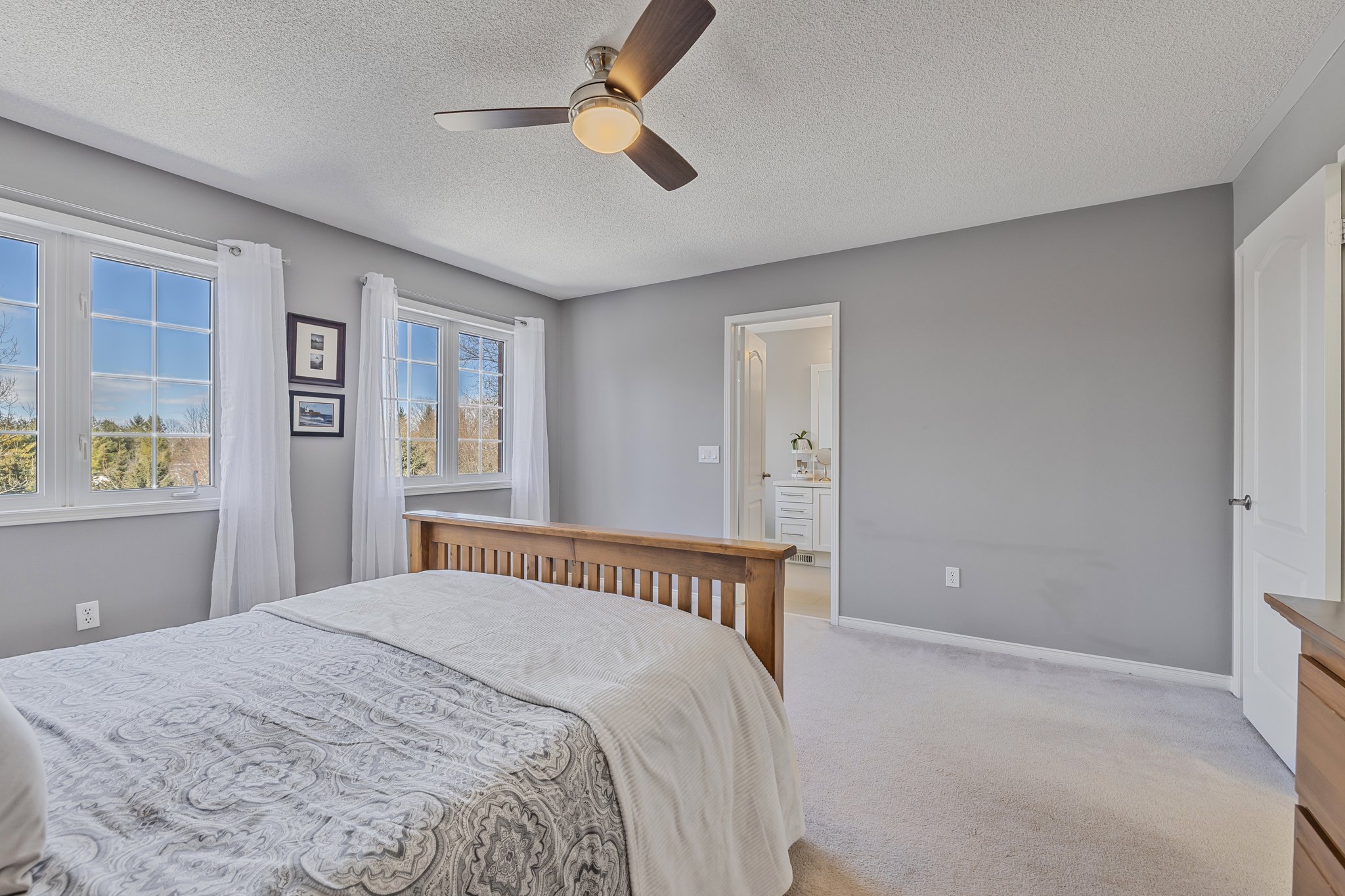 Primary Bedroom overlooking greenspace