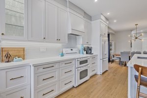 Ample cabinetry & display areas