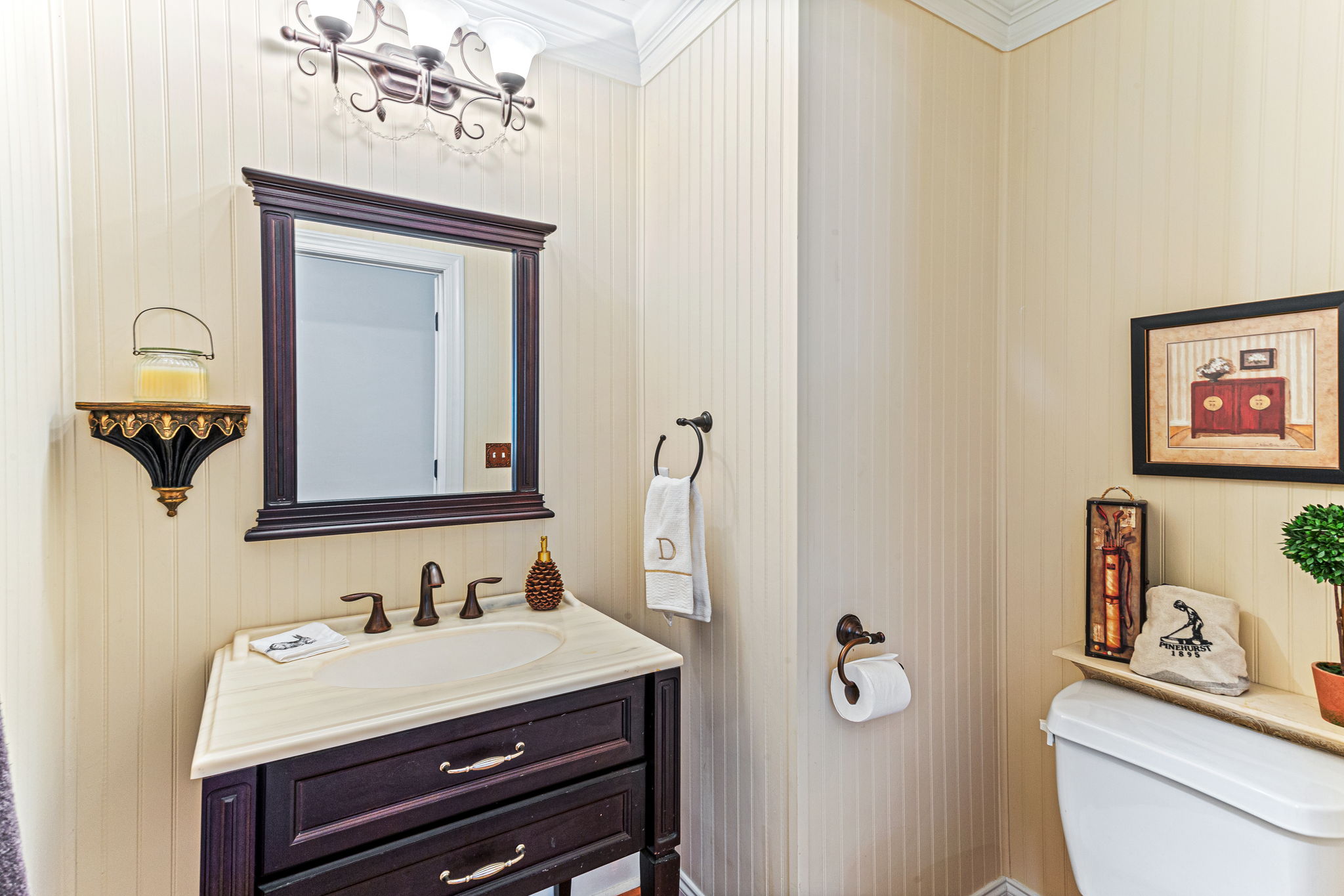 Powder room with custom molding and trim.