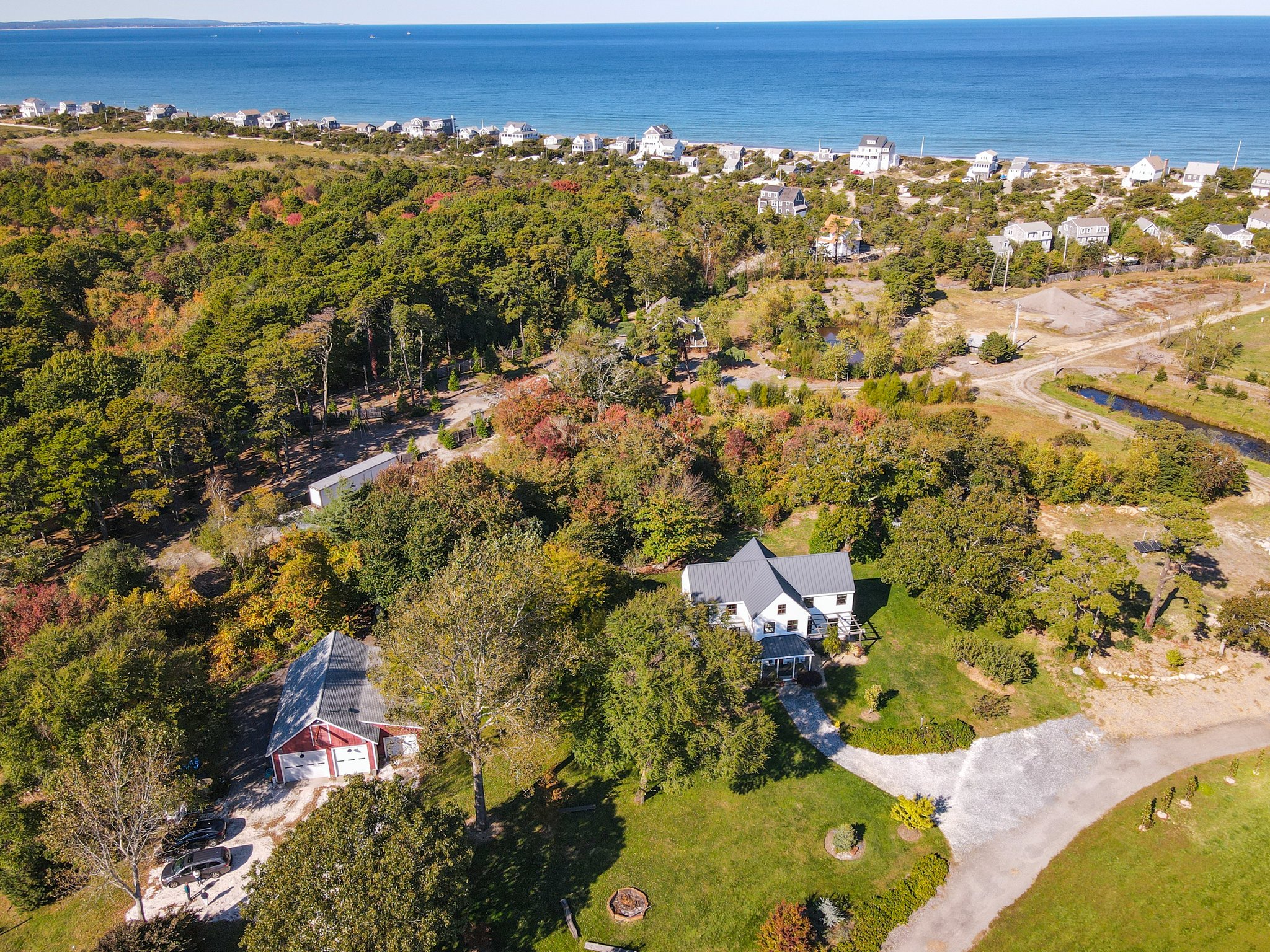 Aerial of Home and Barn to Ocean