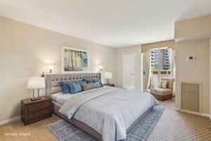 Expansive Primary Bedroom with Access to Balcony