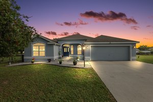Main Residence Twilight Front Elevation