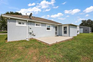 Second Home Rear Patio with Door to Interior Laundry Room