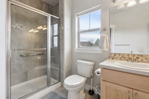 Primary Bedroom Shower and Double Sink Vanity