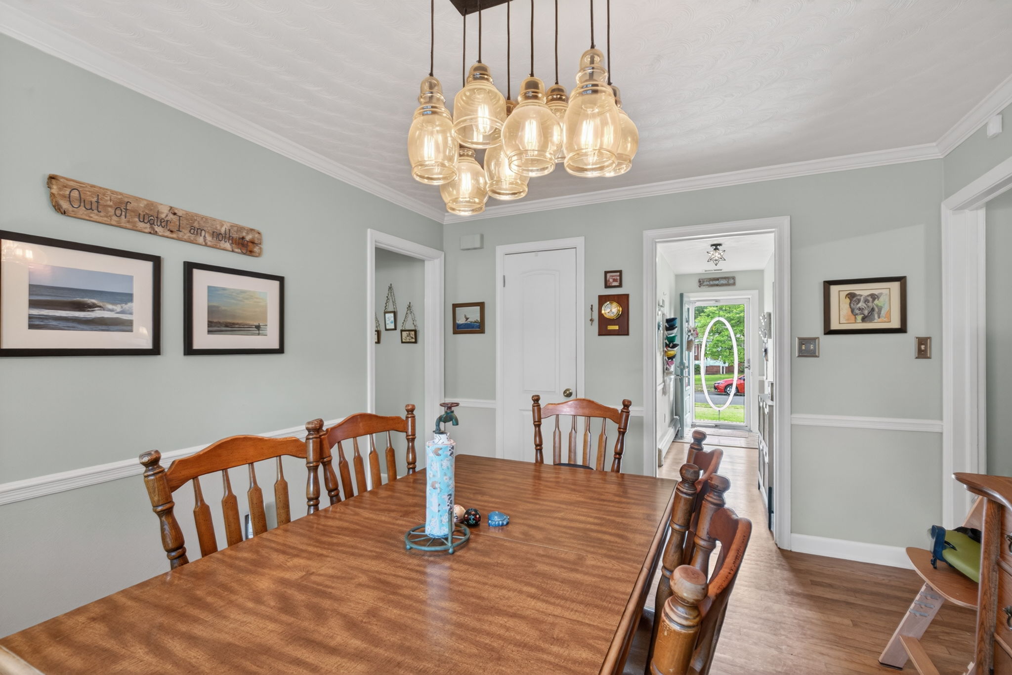 Seamless flow between kitchen, dining, and living spaces.