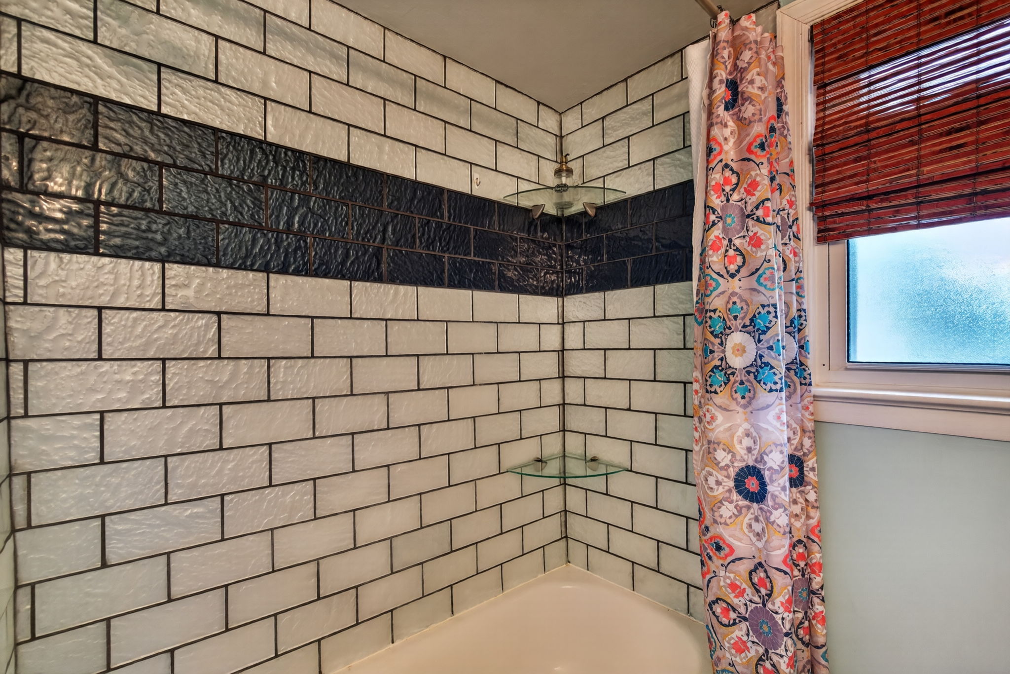 Bright and refreshed hall bath.