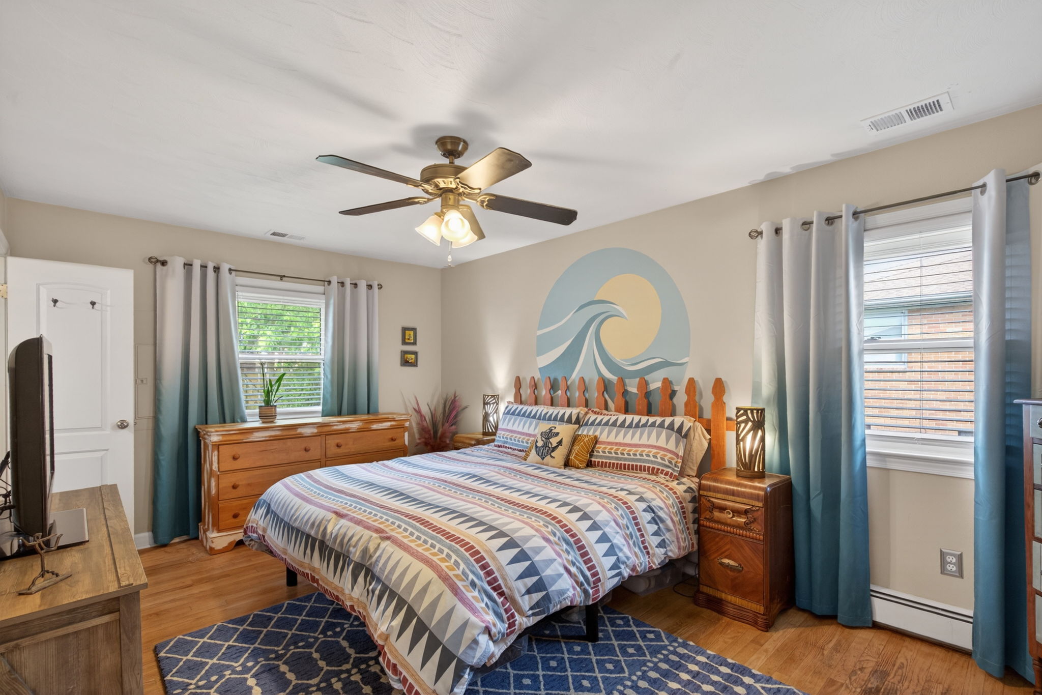 Oversized primary bedroom with peaceful feel.