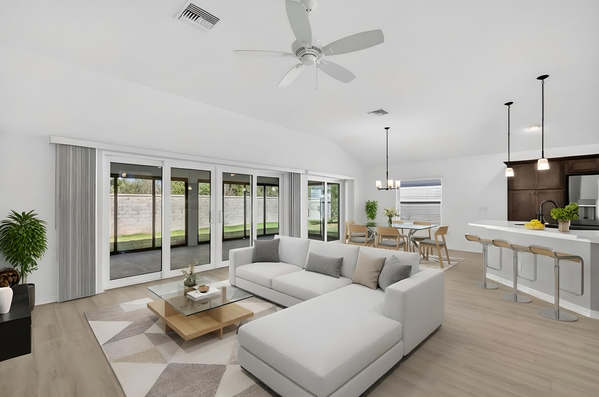 Living, Dining, and Kitchen - VirtuallyStaged