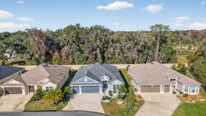 Aerial Front Elevation with Rear Wall and Woods
