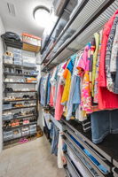 Primary Bedroom Walk-in Closet1b